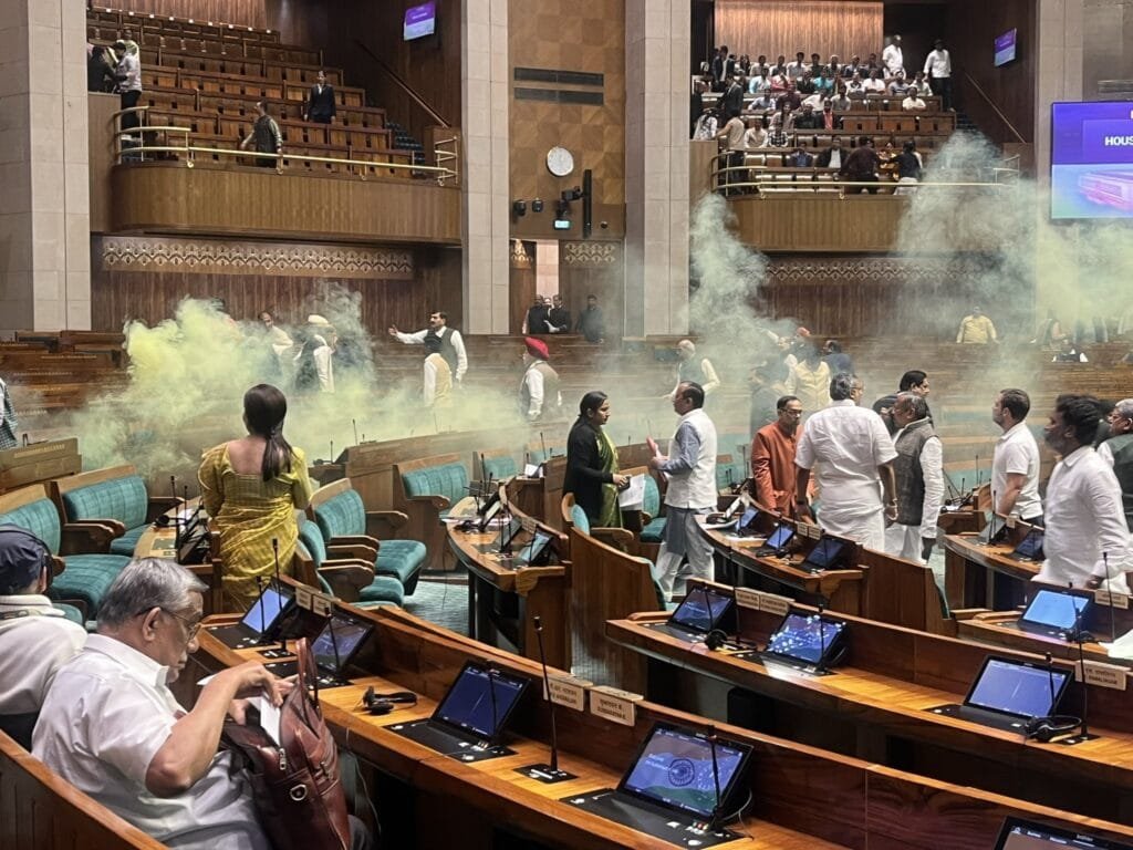 Security Breach Unfolds in Lok Sabha: Disruption and Evacuation Amidst 22nd Anniversary of Parliament Attack